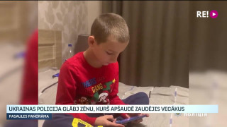 Ukrainas policija glābj zēnu, kurš apšaudē zaudējis vecākus