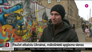 Paužot atbalstu Ukrainai, mākslinieki apglezno sienas