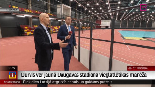 Durvis ver jaunā Daugavas stadiona vieglatlētikas manēža