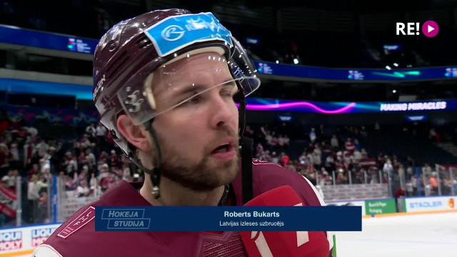 Pasaules hokeja čempionāta spēle Latvija - Austrija. Intervija ar Robertu Bukartu
